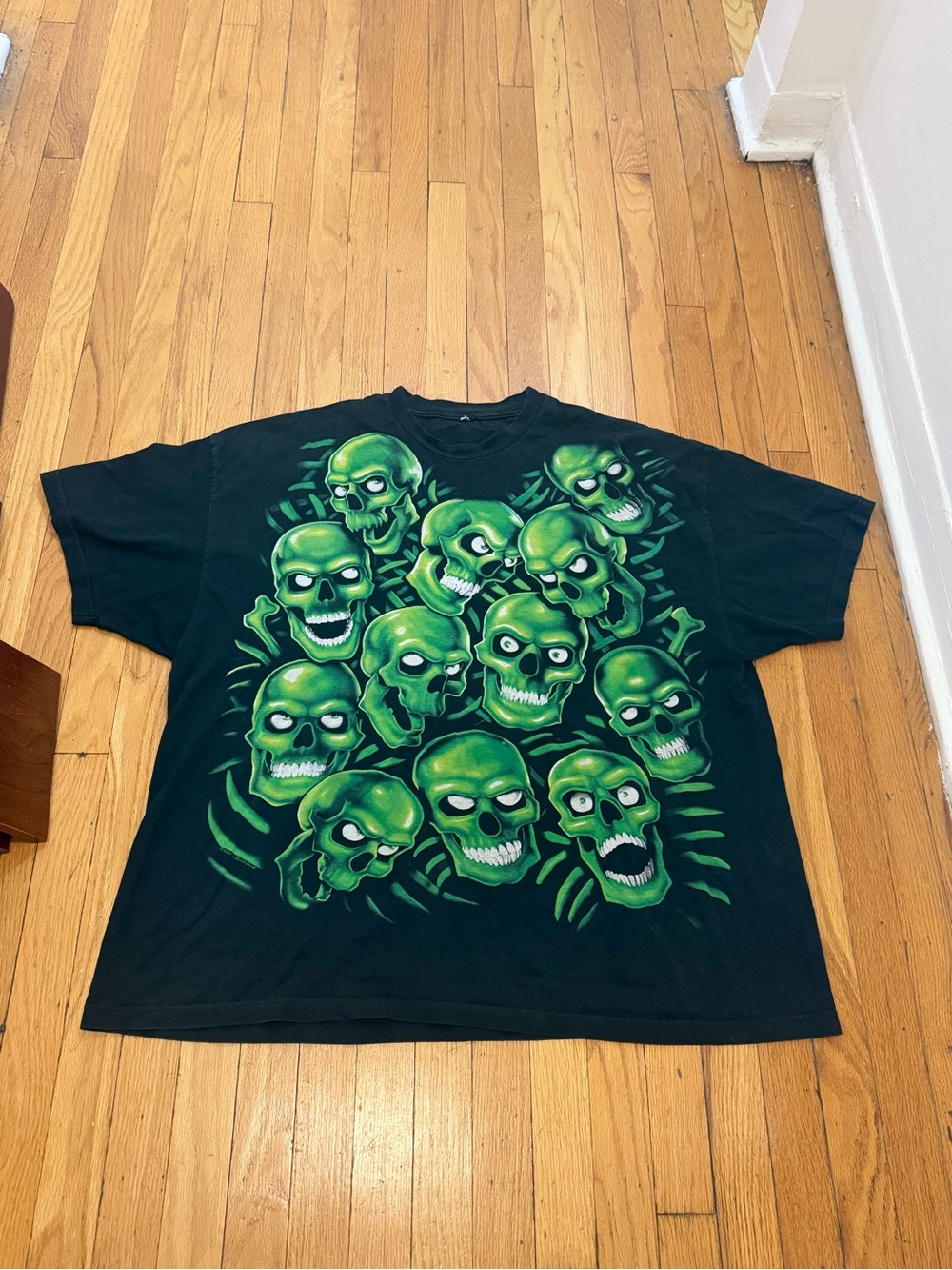 Vintage Black T‑Shirt with Neon Green Skull Graphic